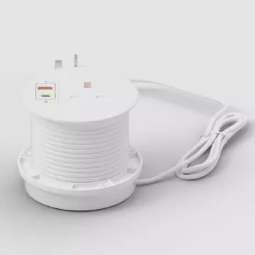 White recessed desk power strip with UK AC outlet USB-A and USB-C ports shown with coiled cable and plug