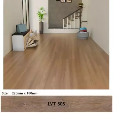 Mahmayi Stonehenge LVT 505 Caramel Oak flooring planks installed in a modern hallway with staircase showing warm wood grain finish and plank size 1220mm x 180mm