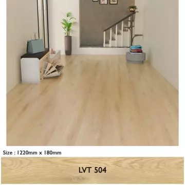 Stonehenge LVT 504 Herringbone Natural Oak flooring installed in a modern entryway showing plank size 1220mm x 180mm