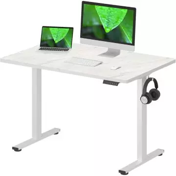 White standing desk with a marble top  featuring a monitor  laptop  keyboard  mouse  and headphones hanging on the side.