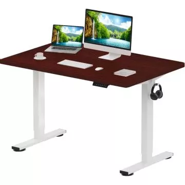 Adjustable standing desk with white legs  a dark wood top  and a headphone hook  featuring a computer  laptop  keyboard  mouse  and a coffee cup.