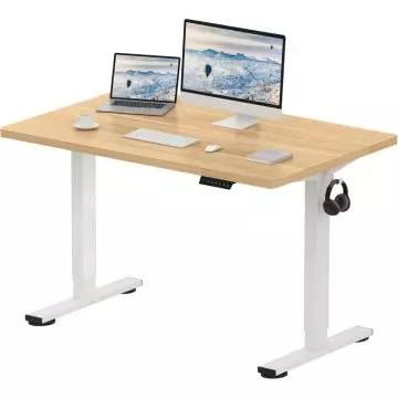Adjustable standing desk with a wood top and white legs  featuring a laptop  monitor  keyboard  mouse  book  coffee cup  and hanging headphones.