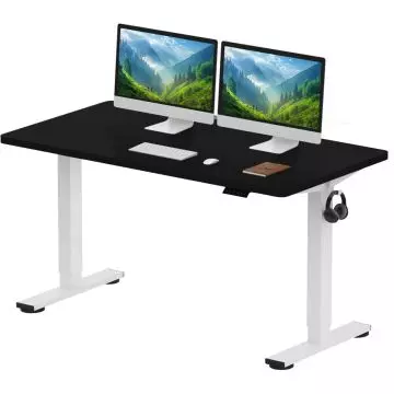 Charcoal black standing desk with white legs and dual monitors