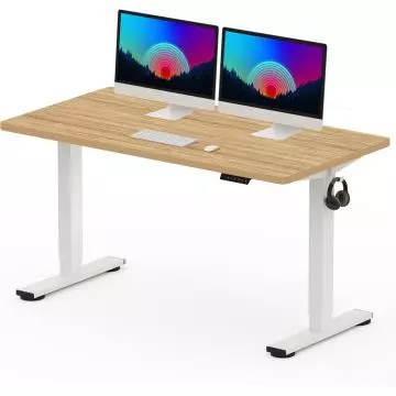 Electric standing desk with woodgrain top and white frame holding dual monitors