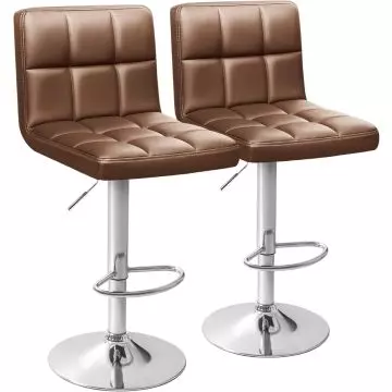 Two brown PU leather bar stools with tufted square seats and chrome pedestal bases