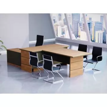 Mahmayi Natural Dijon Walnut Lava Grey L-shaped executive desk styled in a modern high-rise office setting with black visitor chairs