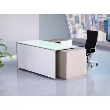 L shaped glass top executive desk in light concrete and white in office setting