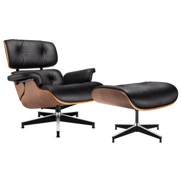 Black leather lounge chair with a matching ottoman  featuring walnut veneer and metal swivel bases.