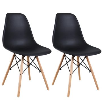 Pack of 2 black Eames style DSW dining chairs with matte plastic shell seats and natural wood Eiffel tower legs on white background