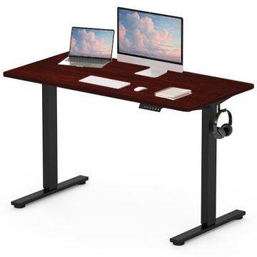 Adjustable standing desk with a dark wood top  black metal legs  and a headset hook  featuring a laptop  monitor  keyboard  and mouse.