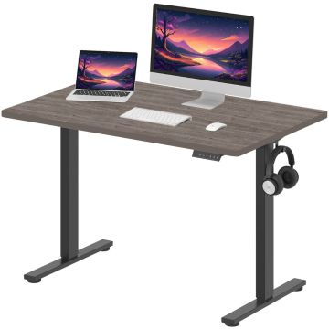 Grey oak electric standing desk with black frame and headset hook