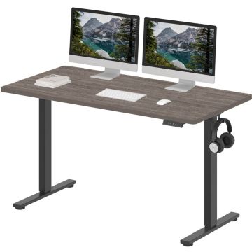 Adjustable standing desk with a dark wood finish  black metal legs  dual monitor setup  keyboard  mouse  and headphone hook.