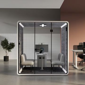 white framed office meeting pod with glass front two benches and central table