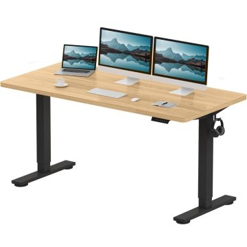 Adjustable standing desk with a light wood top and black legs  featuring two monitors  a laptop  keyboard  mouse  headphones  and a coffee cup.
