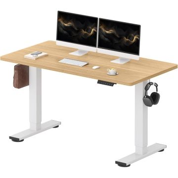 light wood electric standing desk with white frame and side hooks