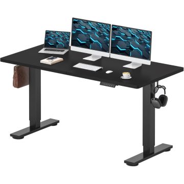 Charcoal black electric standing desk with dual monitors and side hooks