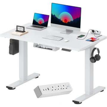White electric standing desk with built in power strip and cable tray