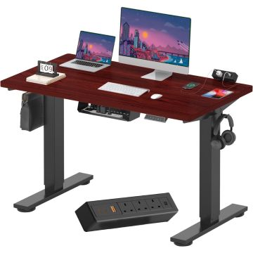 Mahogany top electric standing desk with black frame and clamp power strip