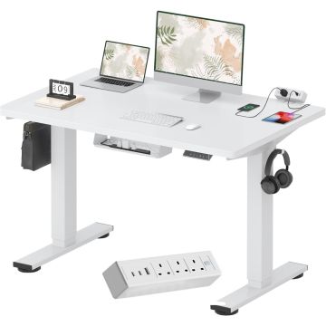 White sit stand desk with built in power strip and cable tray