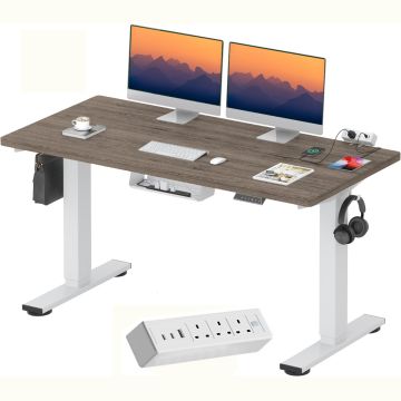 White frame standing desk with gray top dual monitors and built in power strip