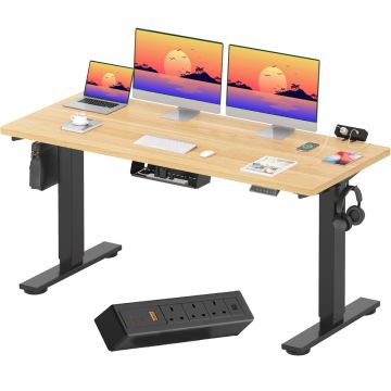 Maple top electric standing desk with black frame dual monitors and tabletop power strip