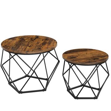 Two round rustic brown tables with black geometric bases