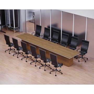 Long walnut conference table with black executive chairs in meeting room