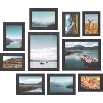 Ten black photo frames with landscape prints arranged