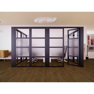 Black aluminum framed glass partition with swing door open revealing conference room with office chairs