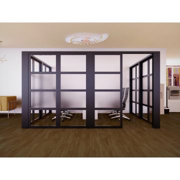 Mahmayi black aluminum framed glass partition forming an office cabin with center frosted glass panels and open sliding door entry