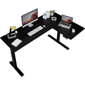 Black L-shaped adjustable standing desk with a monitor  keyboard  laptop  lamp  headphones  books  plant  and cup.