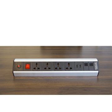 Silver and black power strip with four universal sockets  two USB ports  two network ports  and a red power switch.