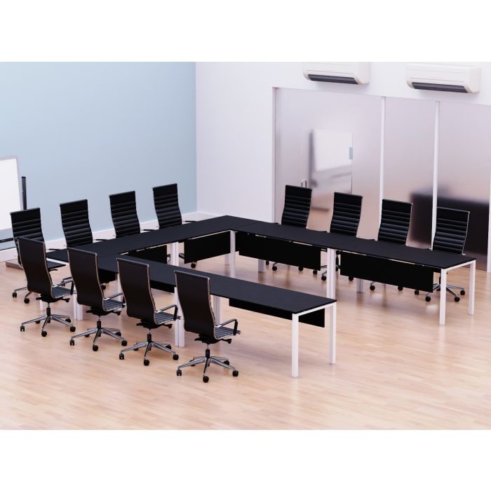 U shaped black conference table with white steel legs set in a meeting room