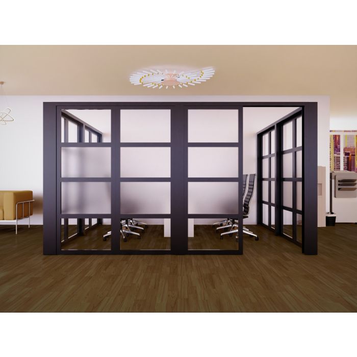 Mahmayi black aluminum framed glass partition forming an office cabin with center frosted glass panels and open sliding door entry