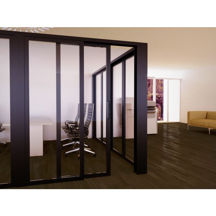 Black aluminum framed full clear glass sliding door partition enclosing a conference room in a modern office